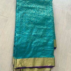 Traditional patty saree blue with purple at the bottom border